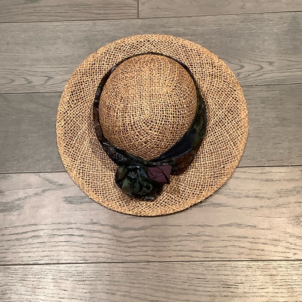 Elegant Tan Straw Hat with Black Ribbon